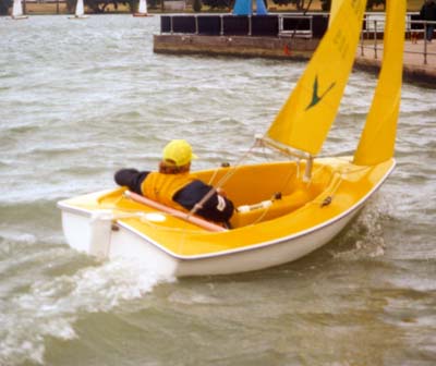 This is me sailing a 303. Note the arm holding me to the upwind side.